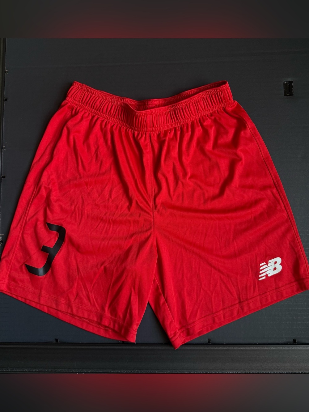 New Balance Men's Bright Red Athletic Shorts with White Logo